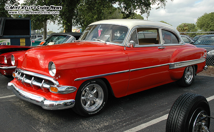 Highlighting this 1954 Chevy Bel Air are red paint a set of American Racing